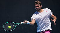Stan Wawrinka Vs Laslo Djere Highlights, Australian Open 2026 First Round: Swiss Advances To Next Round AP Photo/Aaron Favila : Stan Wawrinka of Switzerland plays a forehand return during a practice session, ahead of the Australian Open tennis championship in Melbourne, Australia, Saturday, Jan. 17, 2026.