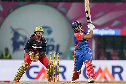 Delhi Capitals' Shafali Verma plays a shot during the Women's Premier League (WPL) T20 cricket match between Royal Challengers Bengaluru and Delhi Capitals, at the DY Patil Stadium, in Navi Mumbai.