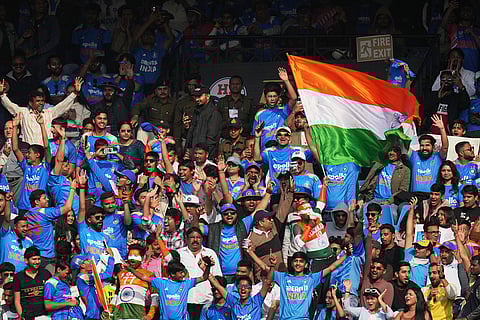 India's fans cheer on their team during the third One Day International cricket match between India and New Zealand in Indore, India.