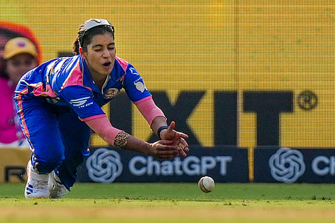 Mumbai Indians' Amanjot Kaur fields during the Women's Premier League (WPL) T20 cricket match between Mumbai Indians and UP Warriorz, at the DY Patil Stadium, in Navi Mumbai.