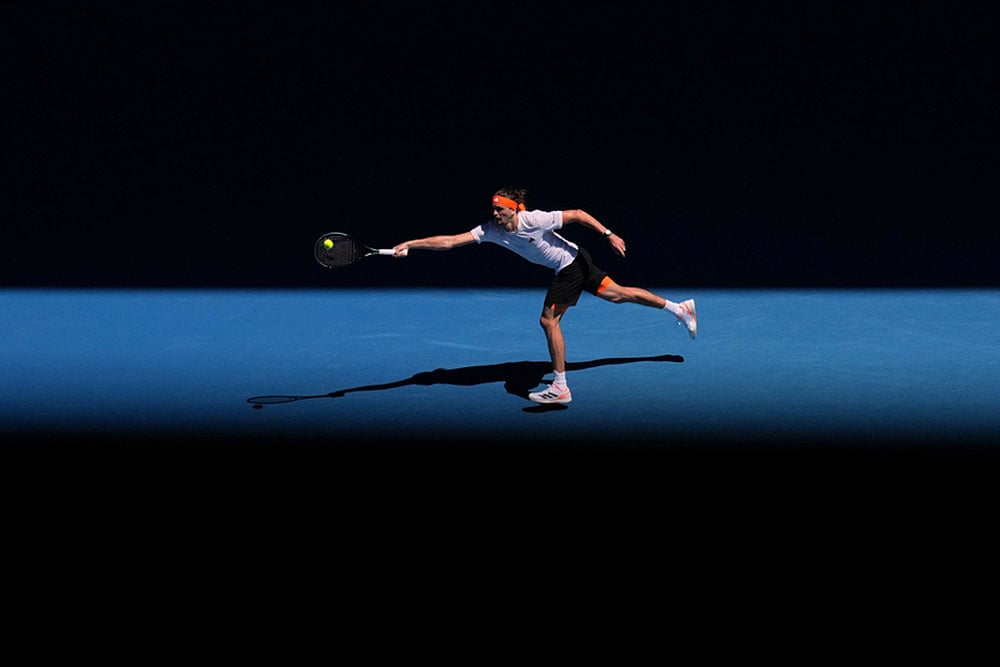 Alexander Zverev of Germany plays a forehand return to Gabriel Diallo of Canada