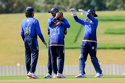 Saurashtra's Ankur Panwar, 21, with teammates celebrates after taking the wicket of Vidarbha's Aman Mokhade during the Vijay Hazare Trophy final cricket match between Vidarbha and Saurashtra, at the BCCI Centre of Excellence ground in Bengaluru.