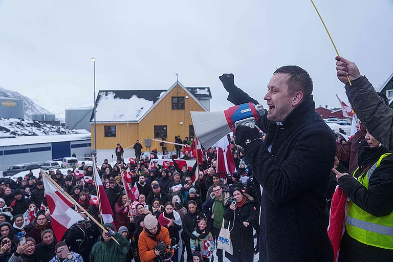 Greenlandic Prime Minister Jens-Frederik Nielsen speaks during a protest against Trump's policy towards Greenland in front of the US consulate in Nuuk, Greenland. - | Photo: AP/Evgeniy Maloletka