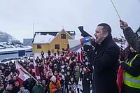 | Photo: AP/Evgeniy Maloletka : Greenlandic Prime Minister Jens-Frederik Nielsen speaks during a protest against Trump's policy towards Greenland in front of the US consulate in Nuuk, Greenland.