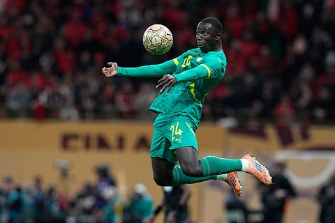 Senegal's Antoine Mendy controls the ball during the Africa Cup of Nations final soccer match between Senegal and Morocco, in Rabat, Morocco.