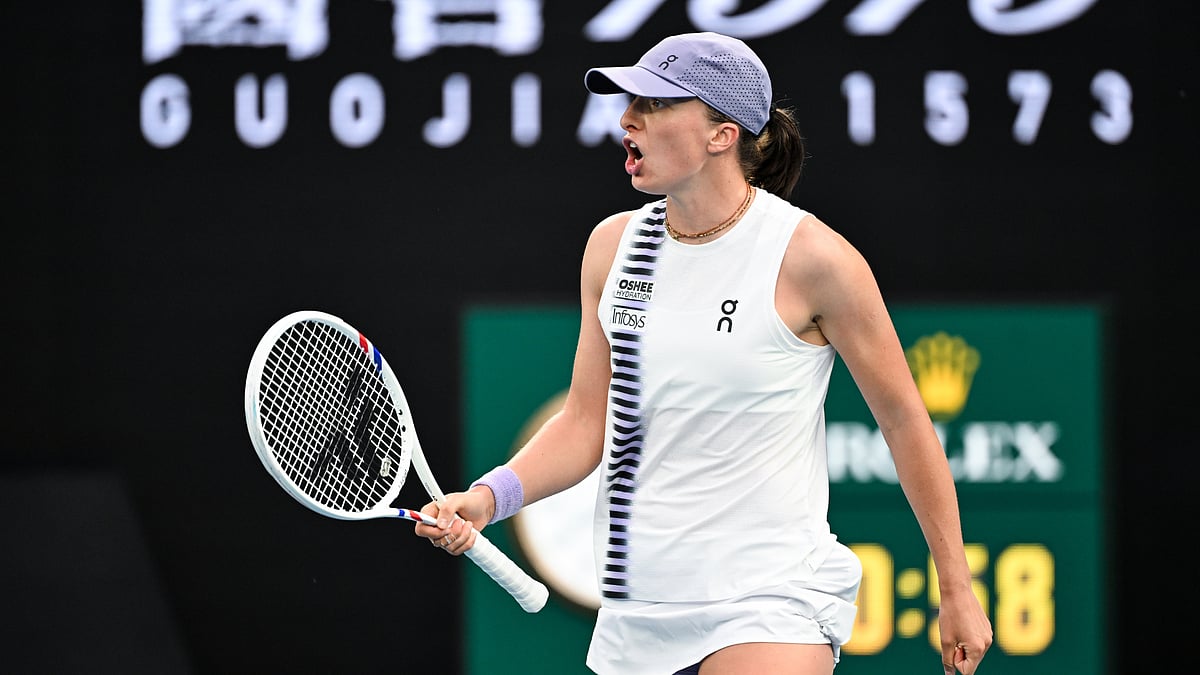 Iga Swiatek in action against Yue Yuan at the Australian Open. - null