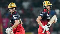 | Photo: PTI/Kunal Patil : Royal Challengers Bengaluru's captain Smriti Mandhana, right, and Georgia Voll sprint between the wickets during the Women's Premier League (WPL) T20 cricket match between Royal Challengers Bengaluru and Delhi Capitals, at the DY Patil Stadium, in Navi Mumbai, Saturday, Jan. 17, 2026. 