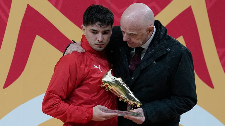 Morocco's Brahim Abdelkader Diaz is embraced by FIFA President Gianni Infantino after reaching the golden boot after the Africa Cup of Nations final soccer match between Senegal and Morocco in Rabat, Morocco, Sunday, Jan. 18, 2026. - | Photo: AP/Themba Hadebe