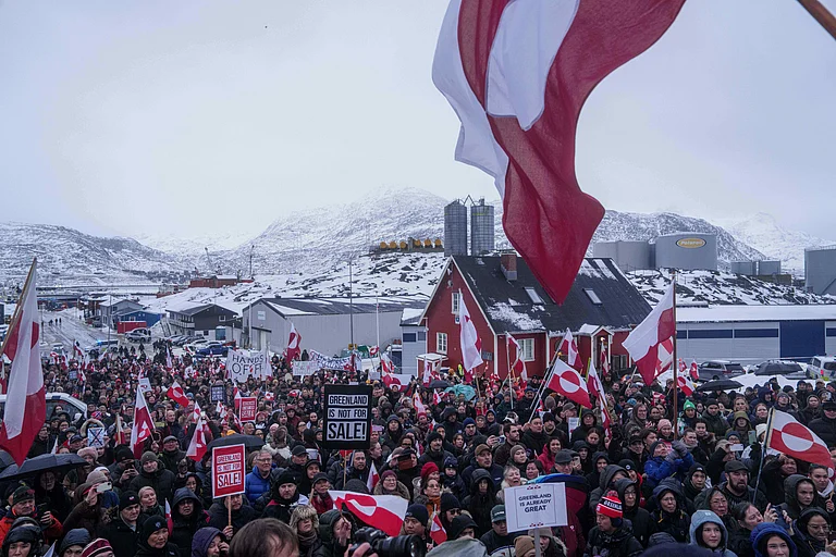 People protest against Trump's policy towards Greenland in front of the US consulate in Nuuk, Greenland, Saturday, Jan. 17, 2026. - EVGENIY MALOLETKA