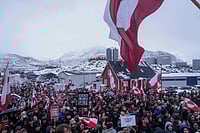 EVGENIY MALOLETKA :   People protest against Trump's policy towards Greenland in front of the US consulate in Nuuk, Greenland, Saturday, Jan. 17, 2026. 