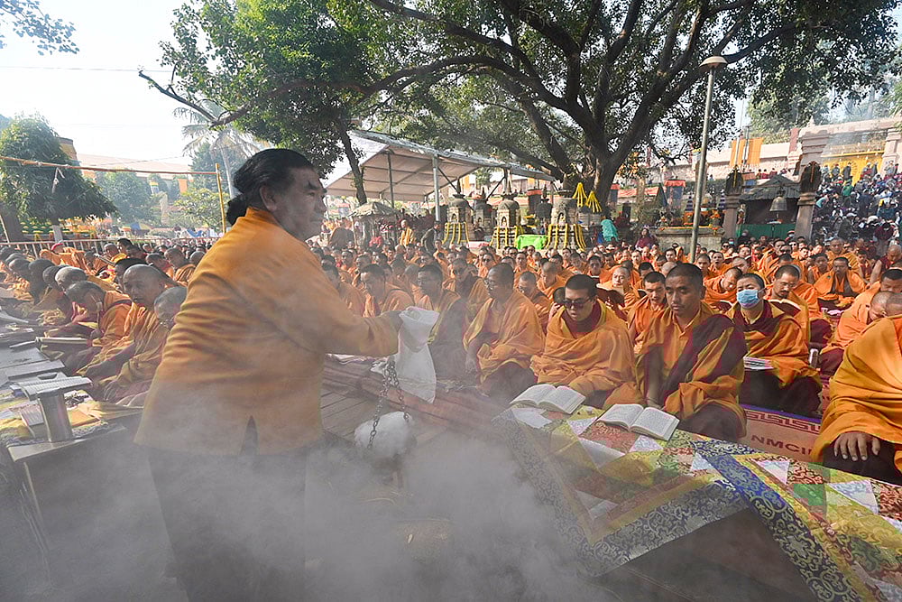 Buddhist monks participate in the 37th Nyingma Monlam Chenmo (World Peace Prayers) at the Mahabodhi Temple, in Bodh Gaya, Bihar. - | Photo: PTI