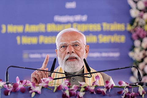 In this image received on Jan. 18, 2026, Prime Minister Narendra Modi addresses a public meeting, at Singur, in Hooghly district, West Bengal.