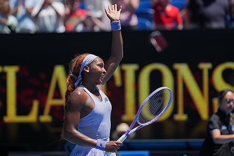 Coco Gauff of the U.S. waves after defeating Kamilla Rakhimova of Uzbekistan in their first round match at the Australian Open tennis championship in Melbourne, Australia.