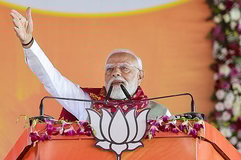In this image posted on Jan. 18, 2026, Prime Minister Narendra Modi addresses a public meeting, at Singur, in Hooghly district, West Bengal. PM Modi launched development projects worth over Rs 830 crore in West Bengal and flagged off three Amrit Bharat trains connecting Kolkata with other parts of the country.