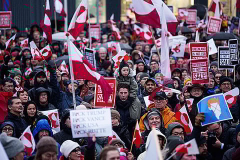 A crowd walks to the US consulate to protest against Trump's policy towards Greenland in Nuuk, Greenland.