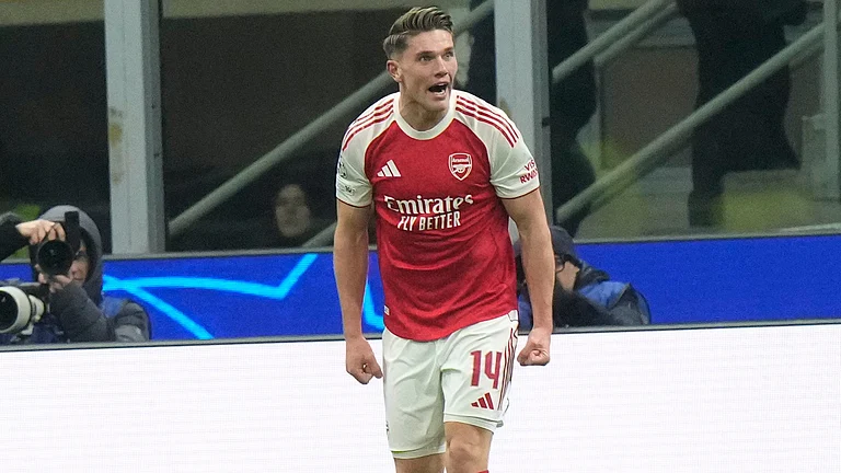 Arsenal's Viktor Gyoekeres celebrates after scoring his side's third goal during the Champions League opening phase soccer match between Inter Milan and Arsenal in Milan, Italy, Tuesday, Jan. 20, 2026 - (AP Photo/Luca Bruno)