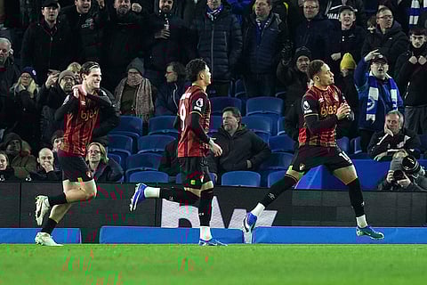 Bournemouth's Marcus Tavernier, right, celebrates after scoring the opening goal during the English Premier League match between Brighton & Hove Albion and AFC Bournemouth in Brighton and Hove, England.