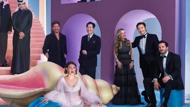 Shah Rukh Khan with Millie Bobby Brown and Lee Jung-jae at the Joy Awards. - Instagram 