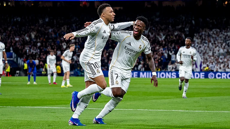Kylian Mbappe and Vinicius Junior celebrate the former's opening goal - null