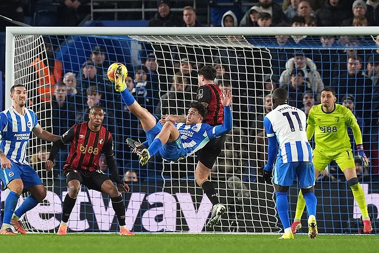 Brighton and Hove Albion's Charalampos Kostoulas scores his side's first goal during the English Premier League match between Brighton & Hove Albion and AFC Bournemouth in Brighton and Hove, England. - | Photo: Gareth Fuller/PA via AP