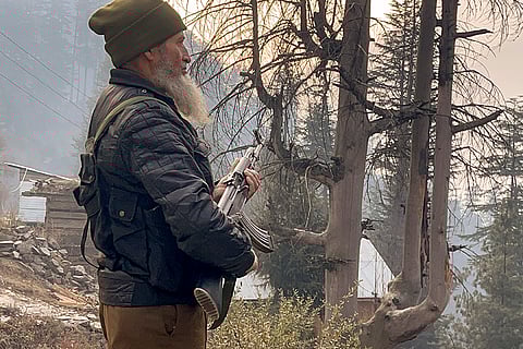 A security officer during a search operation to track down and neutralise terrorists, in Kishtwar district, Jammu and Kashmir.