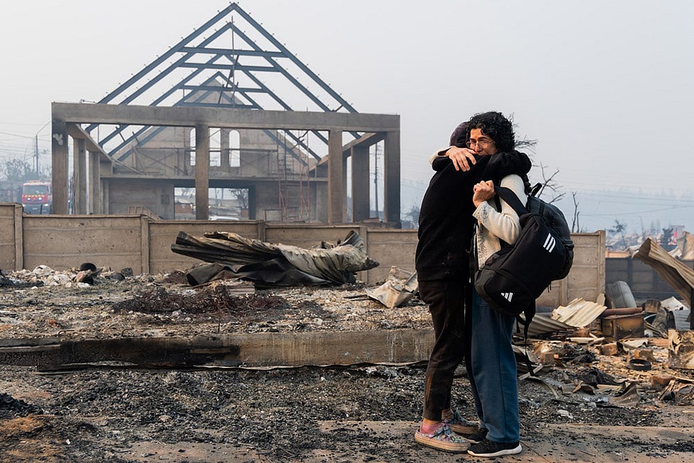 Home burned by wildfires in Tome, Chile
