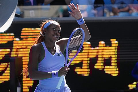 Coco Gauff of the U.S. waves after defeating Olga Danilovic of Serbia in their second round match at the Australian Open tennis championship in Melbourne, Australia.