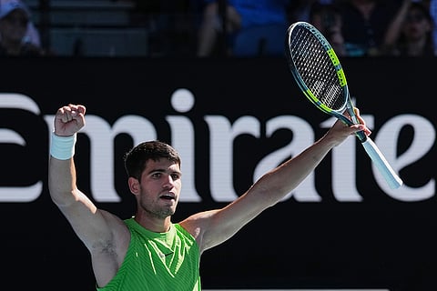 Carlos Alcaraz of Spain celebrates after defeating Yannick Hanfmann of Germany in their second round match at the Australian Open tennis championship in Melbourne, Australia.