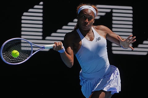 Coco Gauff of the U.S.plays a forehand return to Olga Danilovic of Serbia during their second round match at the Australian Open tennis championship in Melbourne, Australia.