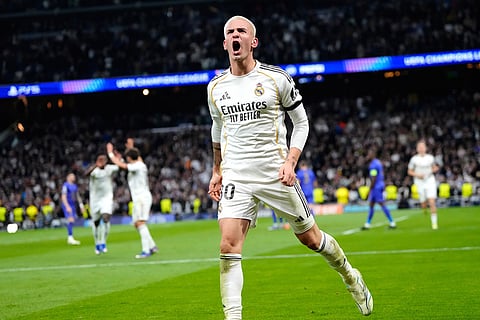 Real Madrid's Franco Mastantuono celebrates his side's third goal during the Champions League opening phase soccer match between Real Madrid and Monaco in Madrid.