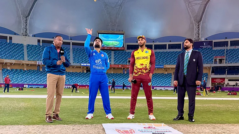 Rashid Khan and Brandon King at AFG vs WI 2nd T20I Toss - @windiescricket/X