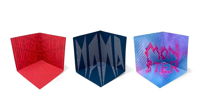 hree folded cube shapes with red lines, blue striped pattern, and purple-blue textured abstract art