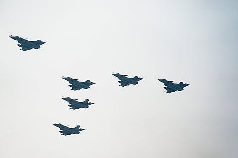 Indian Air Force's six Rafale aircrafts fly past during rehearsals for the Republic Day Parade, in New Delhi.