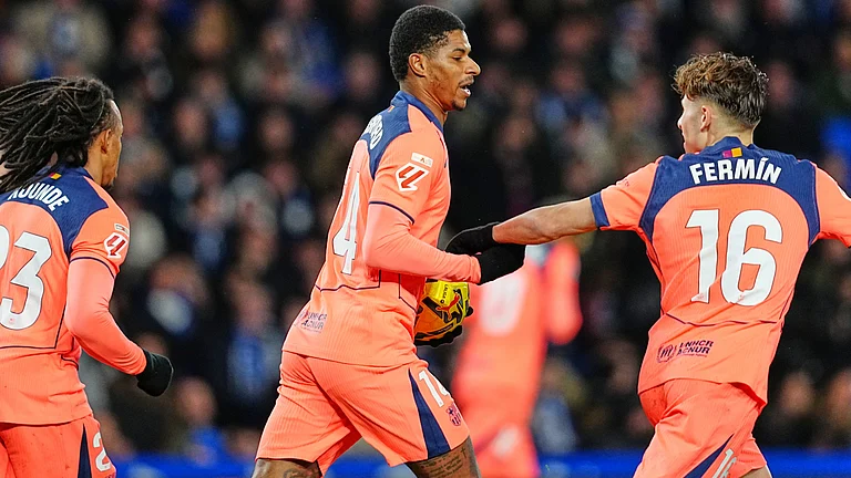 Barcelona's Marcus Rashford, centre, celebrates after scoring his side's opening goal during the Spanish La Liga soccer match between Real Sociedad and Barcelona in San Sebastian, Spain, Sunday, Jan. 18, 2026. - | Photo: AP/Miguel Oses