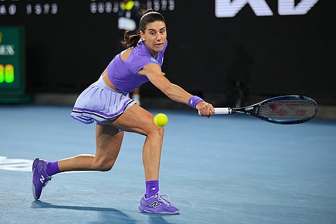 Sorana Cirstea of Romania plays a backhand return to Naomi Osaka of Japan during their second round match at the Australian Open tennis championship in Melbourne, Australia.
