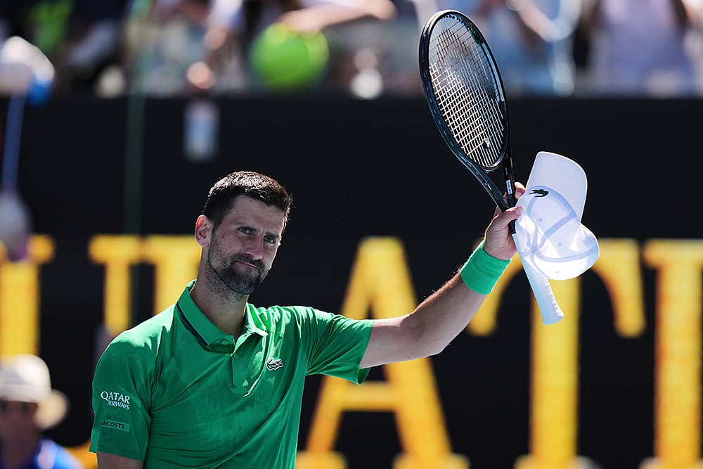 Novak Djokovic of Serbia waves after defeating Francesco Maestrelli of Italy in their second round match at the Australian Open tennis championship in Melbourne, Australia. - | Photo: AP/Aaron Favila