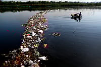 SURESH K PANDEY : Yamuna riverbank littered 