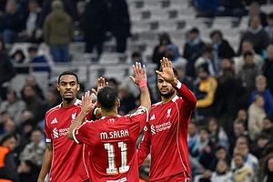 | Photo: AP/Philippe Magoni : Liverpool's Cody Gakpo, right, celebrates with Liverpool's Mohamed Salah, centre, and Liverpool's Ryan Gravenberch after scoring his side's third goal during the Champions League opening phase soccer match between Marseille and Liverpool in Marseille, France.