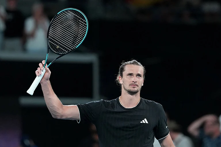 Alexander Zverev of Germany waves after defeating Alexandre Muller of France in their second round match at the Australian Open tennis championship in Melbourne, Australia. - | Photo: AP/Aaron Favila