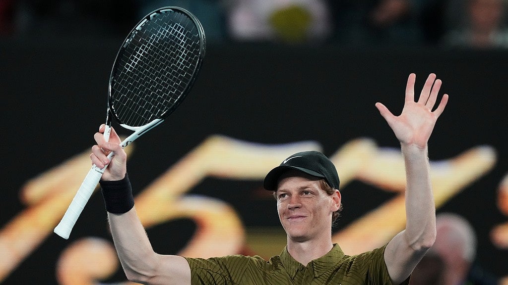 Jannik Sinner of Italy waves after winning his second round match against James Duckworth of Australia at the Australian Open tennis championship in Melbourne. - Photo: AP