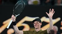 Photo: AP : Jannik Sinner of Italy waves after winning his second round match against James Duckworth of Australia at the Australian Open tennis championship in Melbourne.