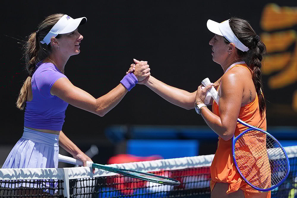 Jessica Pegula, right, of the U.S. is congratulated by compatriot McCartney Kessler, left, following their second round match at the Australian Open tennis championship in Melbourne, Australia. - | Photo: AP/Aaron Favila