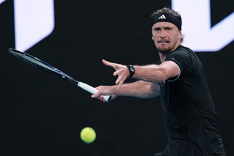 Alexander Zverev of Germany plays a forehand return to Alexandre Muller of France during their second round match at the Australian Open tennis championship in Melbourne, Australia.