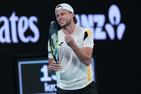 Alexandre Muller of France reacts during his second round match against Alexander Zverev of Germany at the Australian Open tennis championship in Melbourne, Australia.
