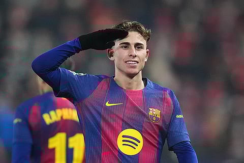 Barcelona's Fermin Lopez celebrates after scoring his side's second goal during the Champions League opening phase soccer match between Slavia Prague and Barcelona in Prague, Czech Republic.