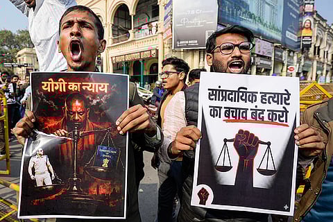 NSUI and Samajwadi Party activists stage a joint protest against the state government over the transfer of Sambhal Chief Judicial Magistrate (CJM) Vibhanshu Sudheer in connection with the Sambhal violence case, at Hazratganj crossing, in Lucknow.