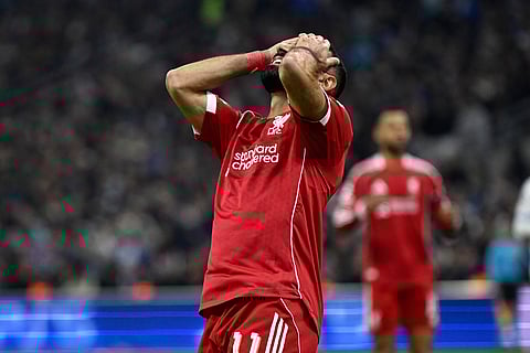 Liverpool's Mohamed Salah reacts during the Champions League opening phase soccer match between Marseille and Liverpool in Marseille, France.