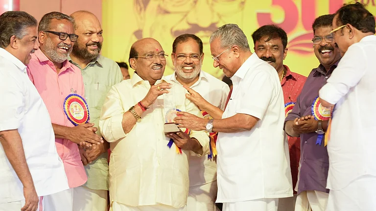 Pinarayi Vijayan with Vellappally Natesan - null