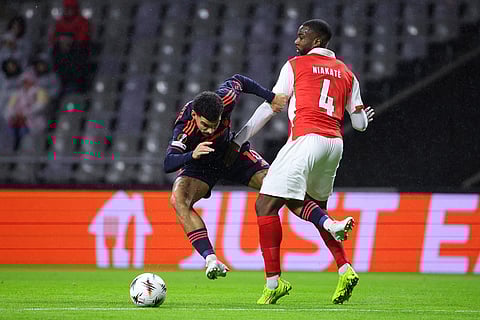 Braga's Sikou Niakate, right, fouls Nottingham Forest's Morgan Gibbs-White during the Europa League opening phase soccer match between SC Braga and Nottingham Forest in Braga, Portugal.