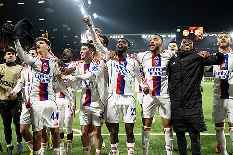 Lyon's players celebrate after the Europa League opening phase soccer match between Young Boys and Olympique Lyonnais, in Bern, Switzerland.